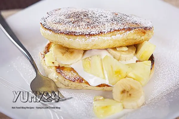 Get a taste of the islands with this tropical pancake recipe loaded with pineapple, coconut, and banana. The Island Today At yumy24 & Get Your Next Breakfast